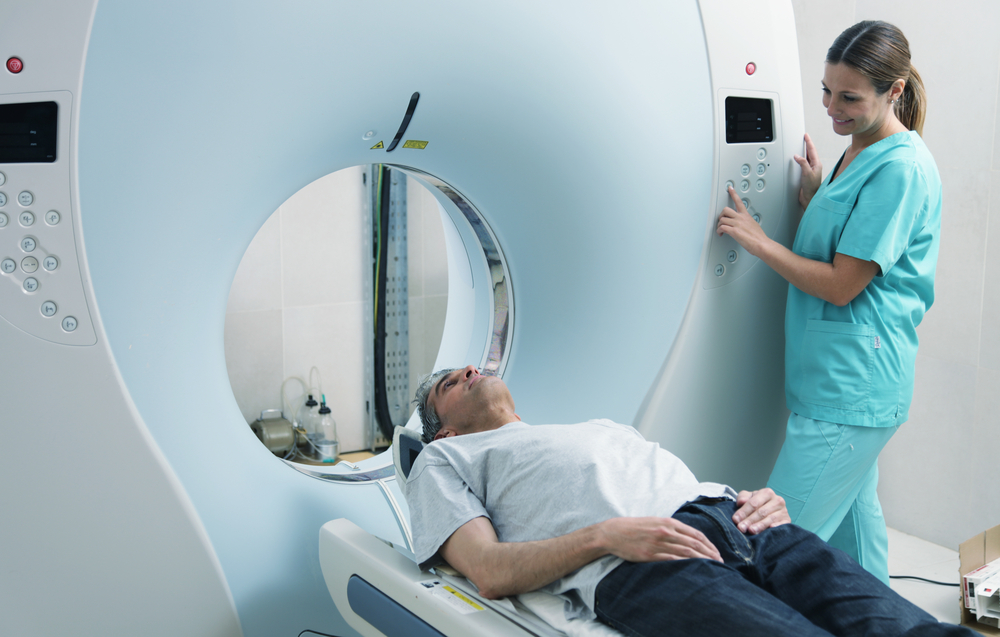 Male patient waiting to get CT scan