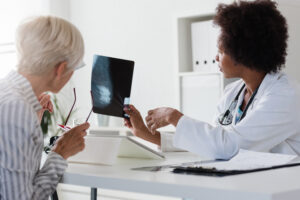 Doctor reviewing mammogram results. 
